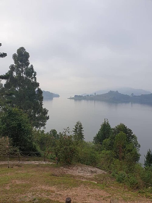 A lakeside view across Lake Bunyonyi and the surrounding hills.